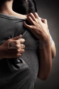 6829744-a-husband-embrace-her-sad-wife-in-dark-background-theme